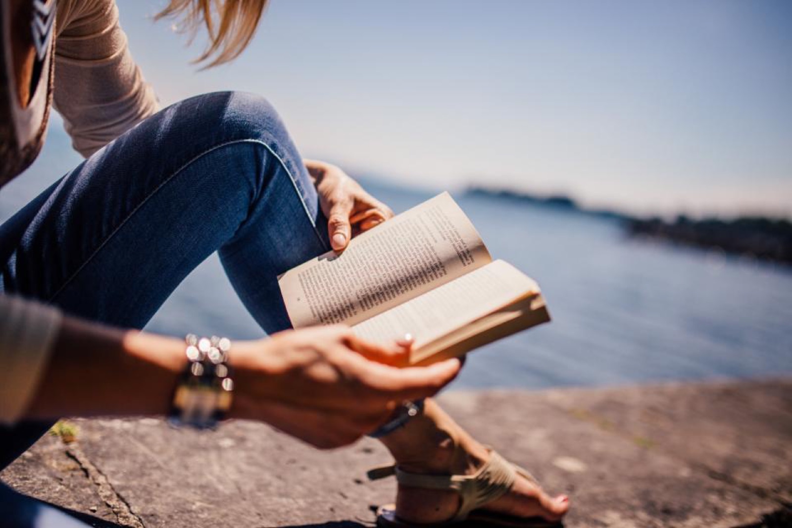 An open book being read at a table